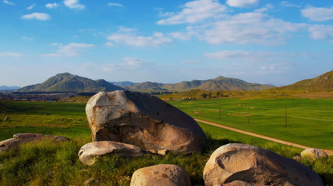 Aerial view of rocky terrain and open landscape